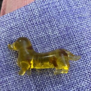 Vintage early plastic lucite dachshund doxie dog pin.